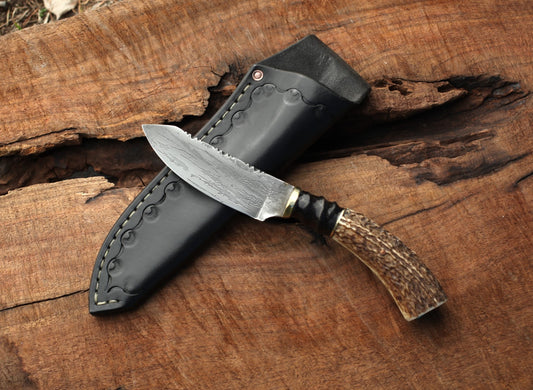 Etched Utility/Hunter with elk and blesbok horn