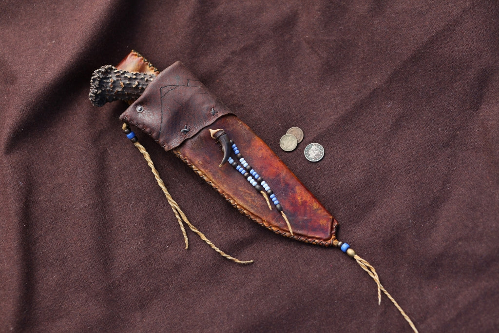Wolf camp knife, carved antler