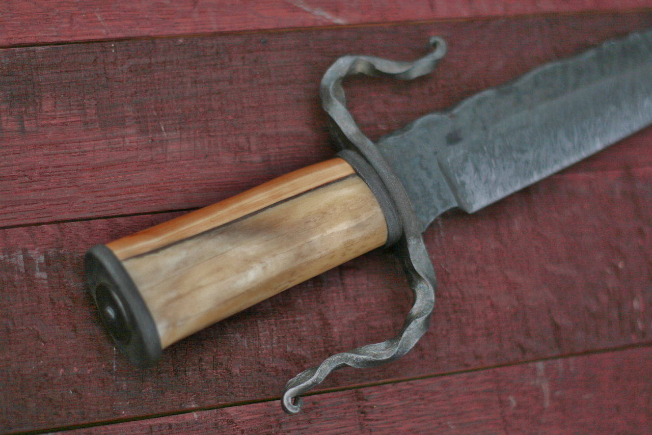 Custom forged fighter, elk and yew wood