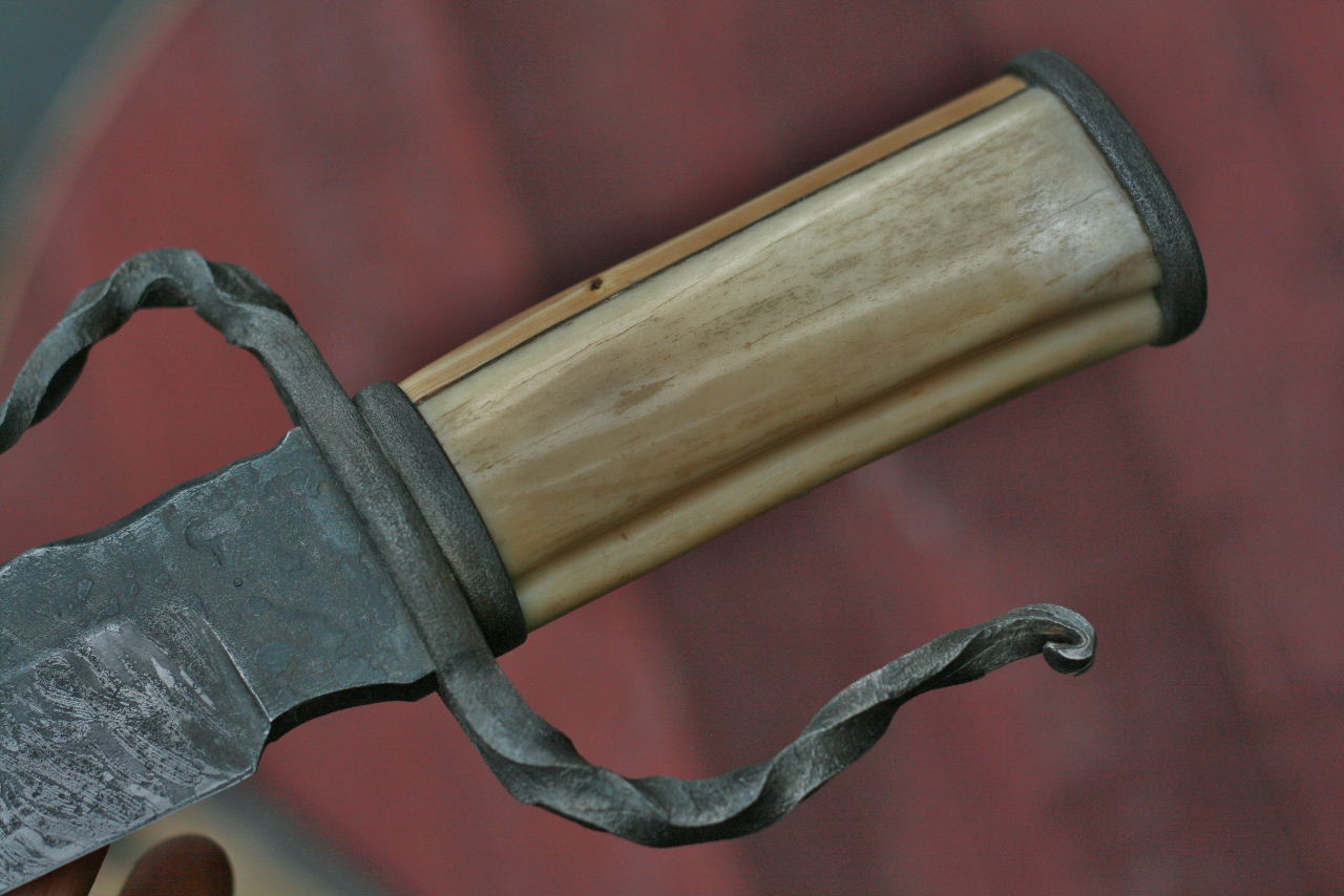 Custom forged fighter, elk and yew wood