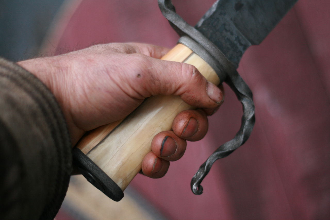 Custom forged fighter, elk and yew wood