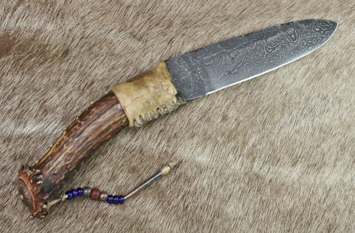 1800's Damascus Hunter in rawhide