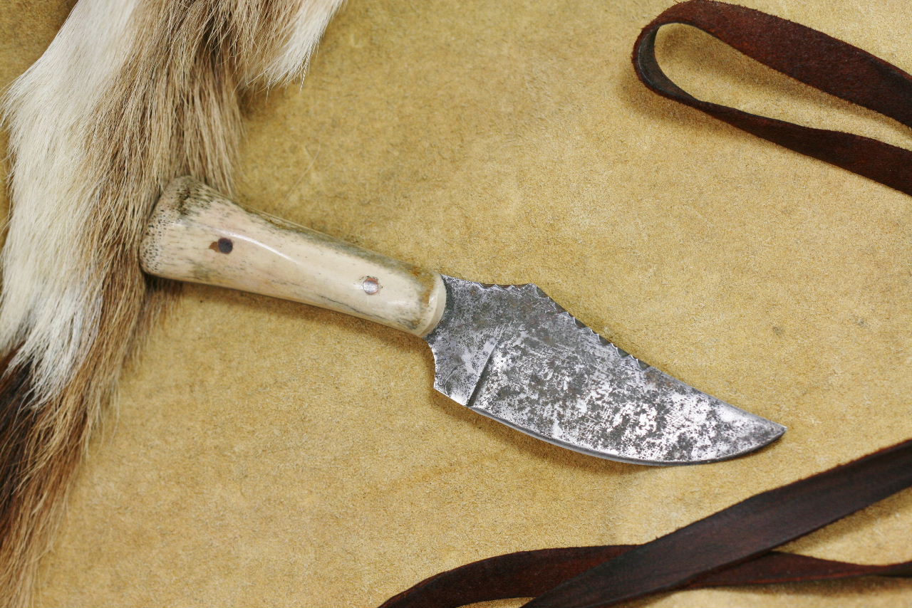 Bison Bone Neck Knife in rawhide
