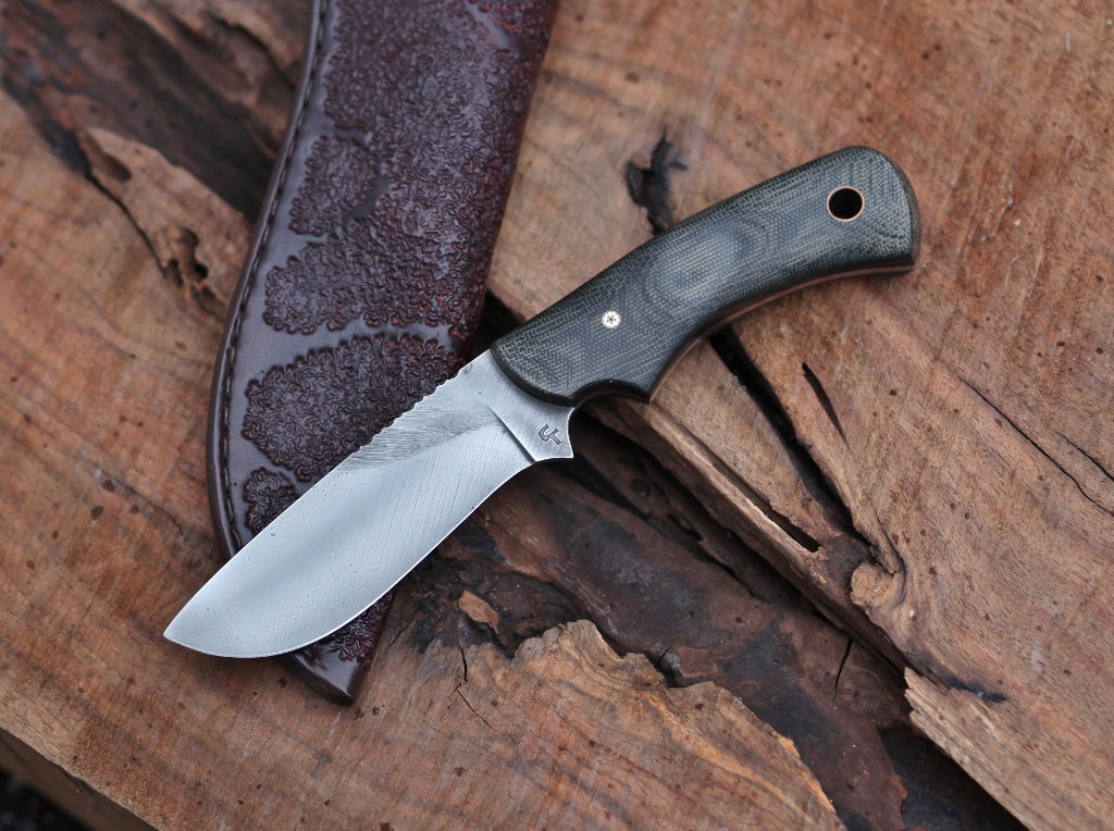 Large game hunter-canvas micarta