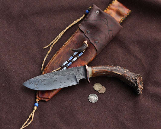 Wolf camp knife, carved antler