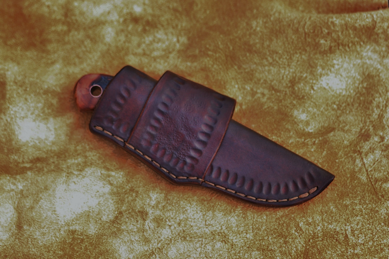 Spay point, utility/hunting knife, mandrone root