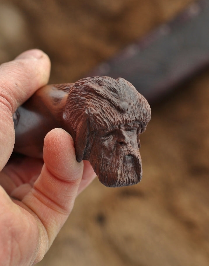 Mountain Bowie, carved walnut Mountain Man