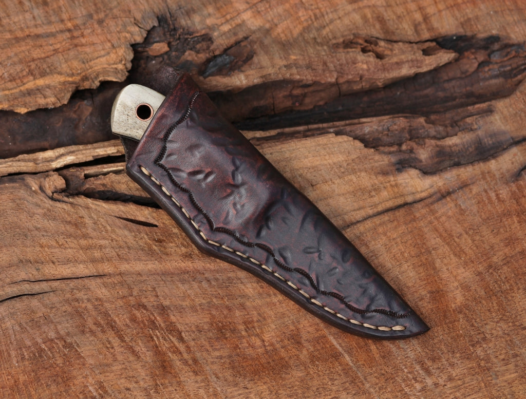 Etched hunter, elk antler