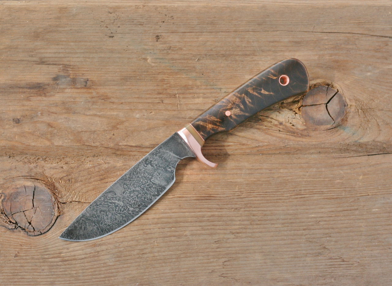 Custom drop point utility/skinner