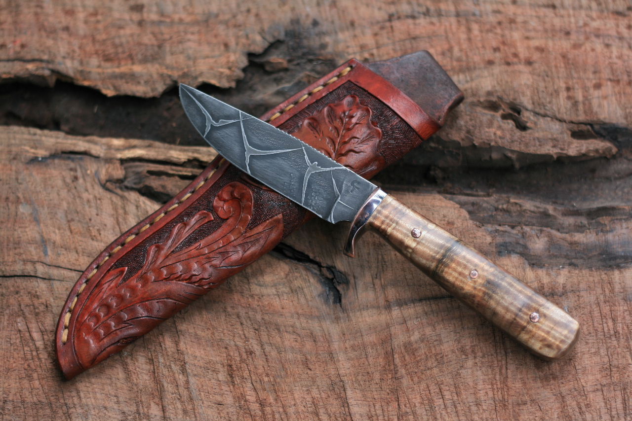 Etched hunter with spalted fiddleback maple.