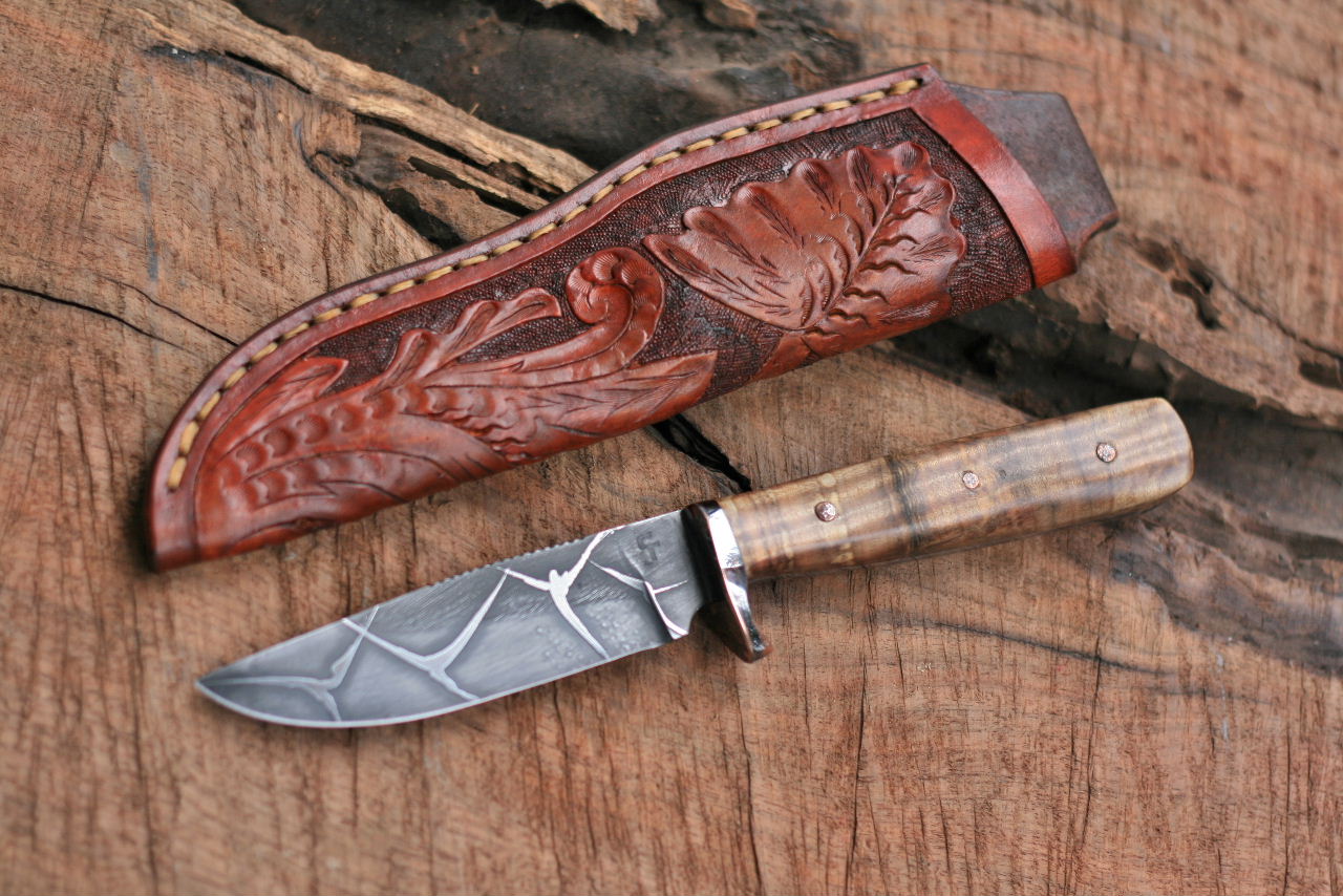 Etched hunter with spalted fiddleback maple.