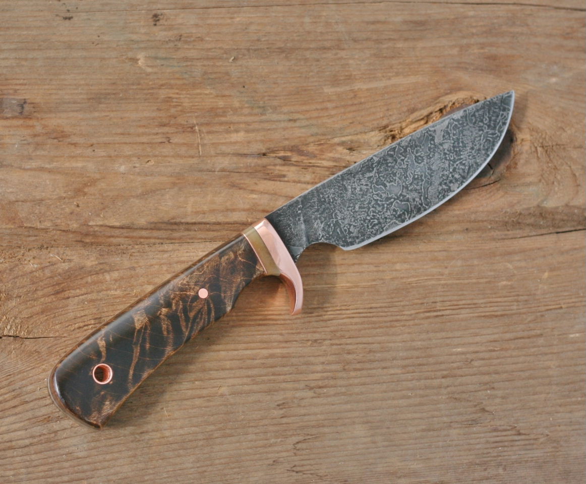 Custom drop point utility/skinner