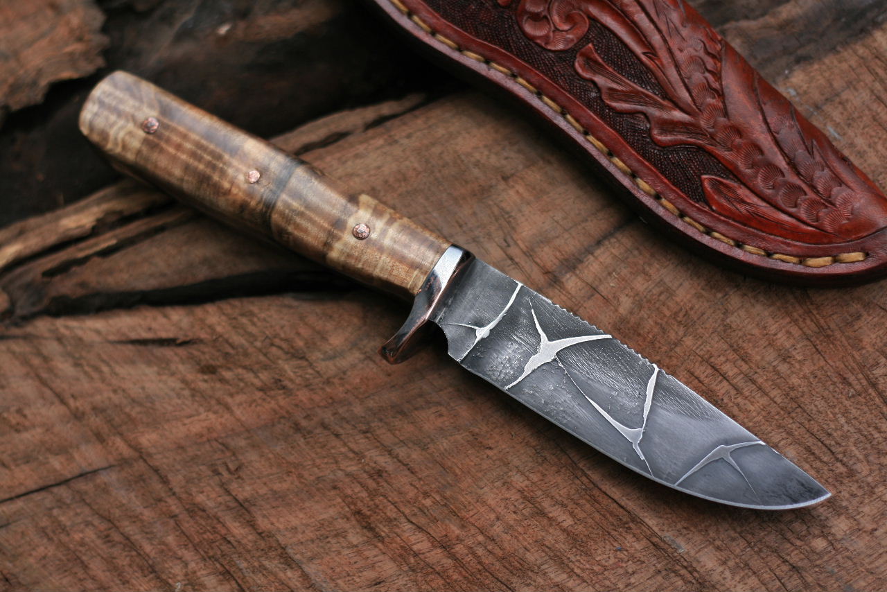 Etched hunter with spalted fiddleback maple.