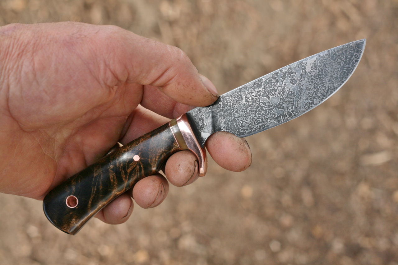 Custom drop point utility/skinner