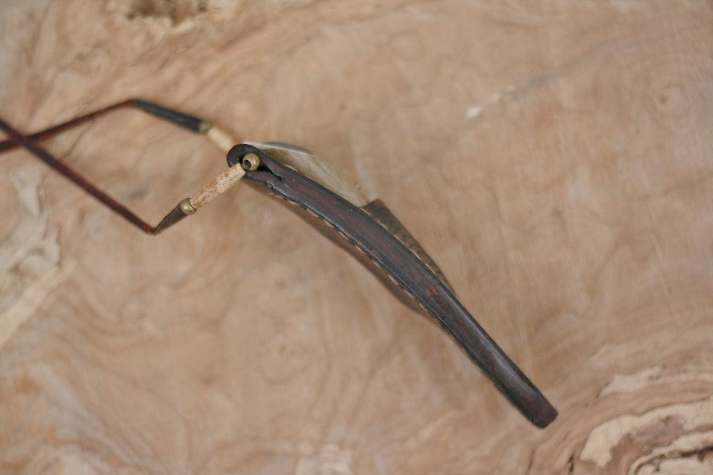 Custom neck knife, white tail antler and stone