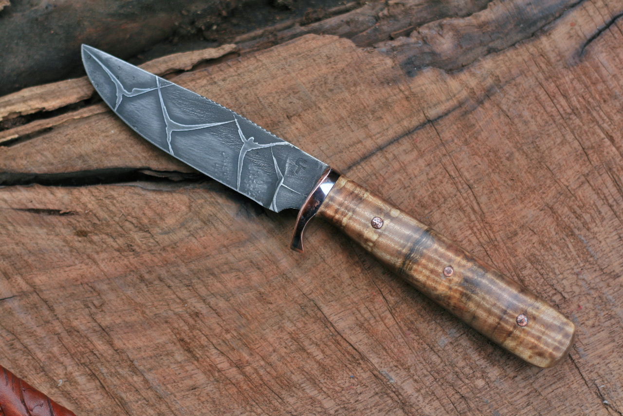 Etched hunter with spalted fiddleback maple.