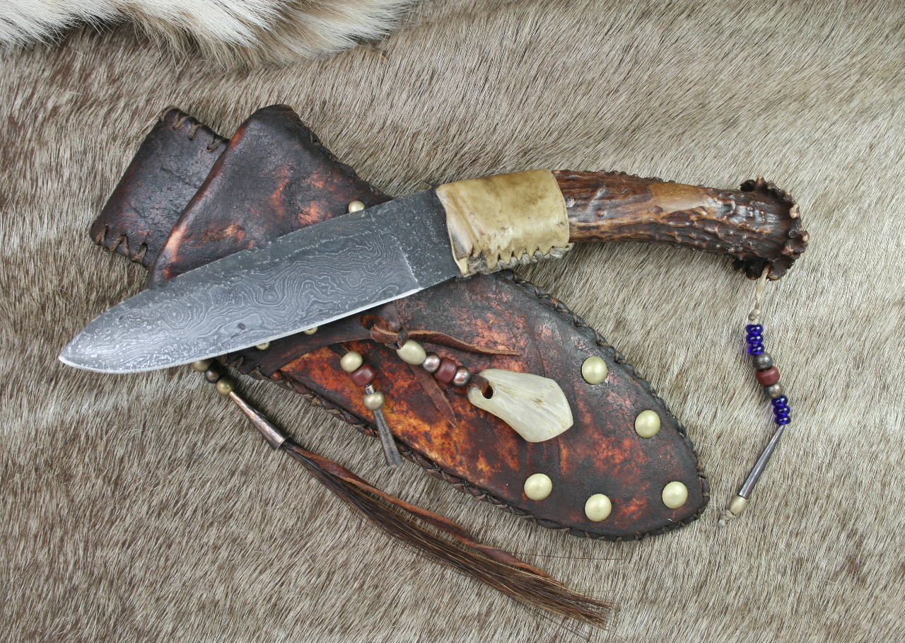 1800's Damascus Hunter in rawhide