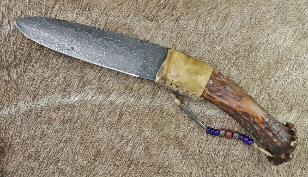 1800's Damascus Hunter in rawhide