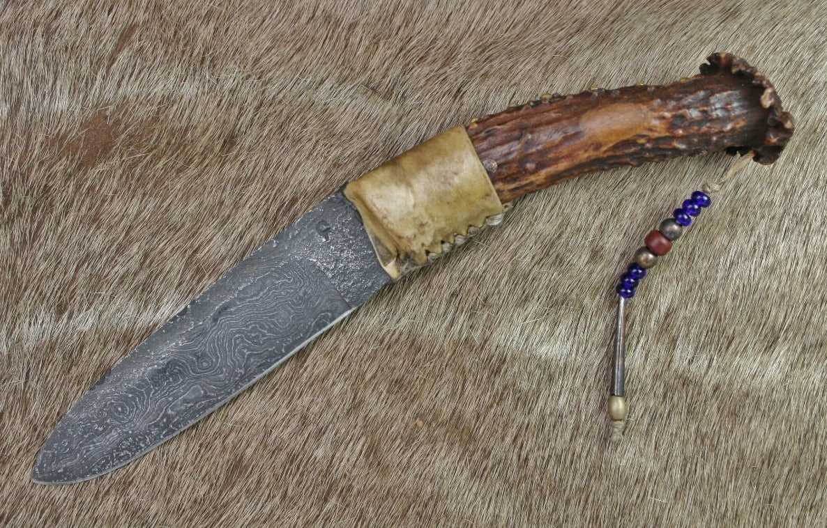 1800's Damascus Hunter in rawhide