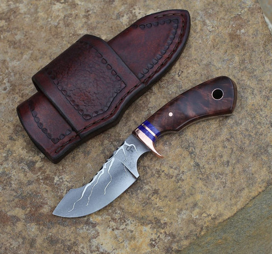 Modified drop point hunter/skinner, fancy walnut