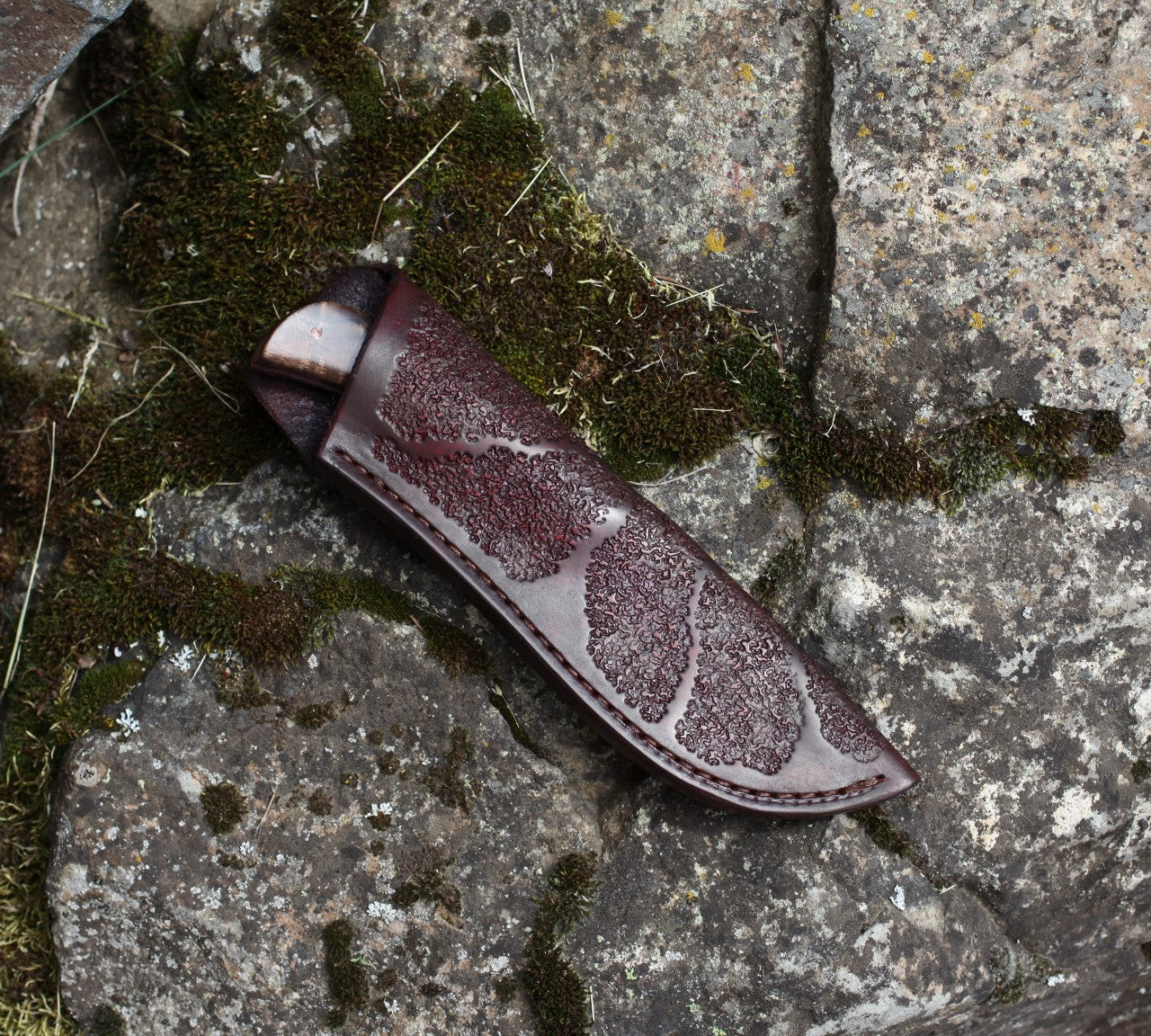 Large game hunter, redwood burl