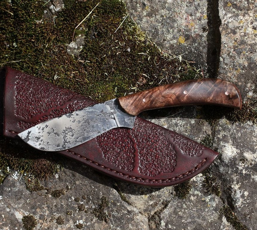 Large game hunter, redwood burl