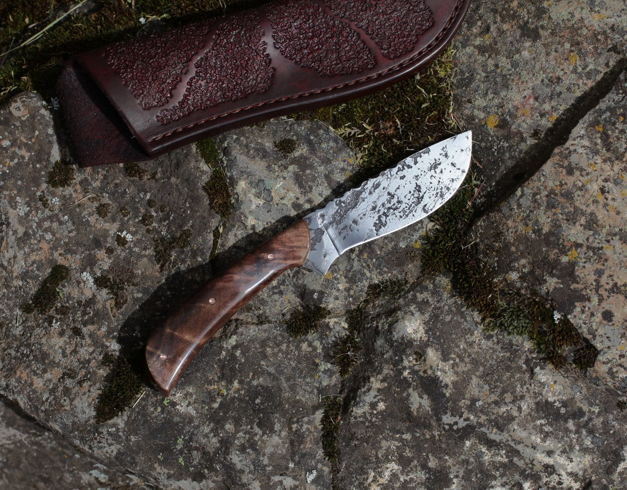 Large game hunter, redwood burl