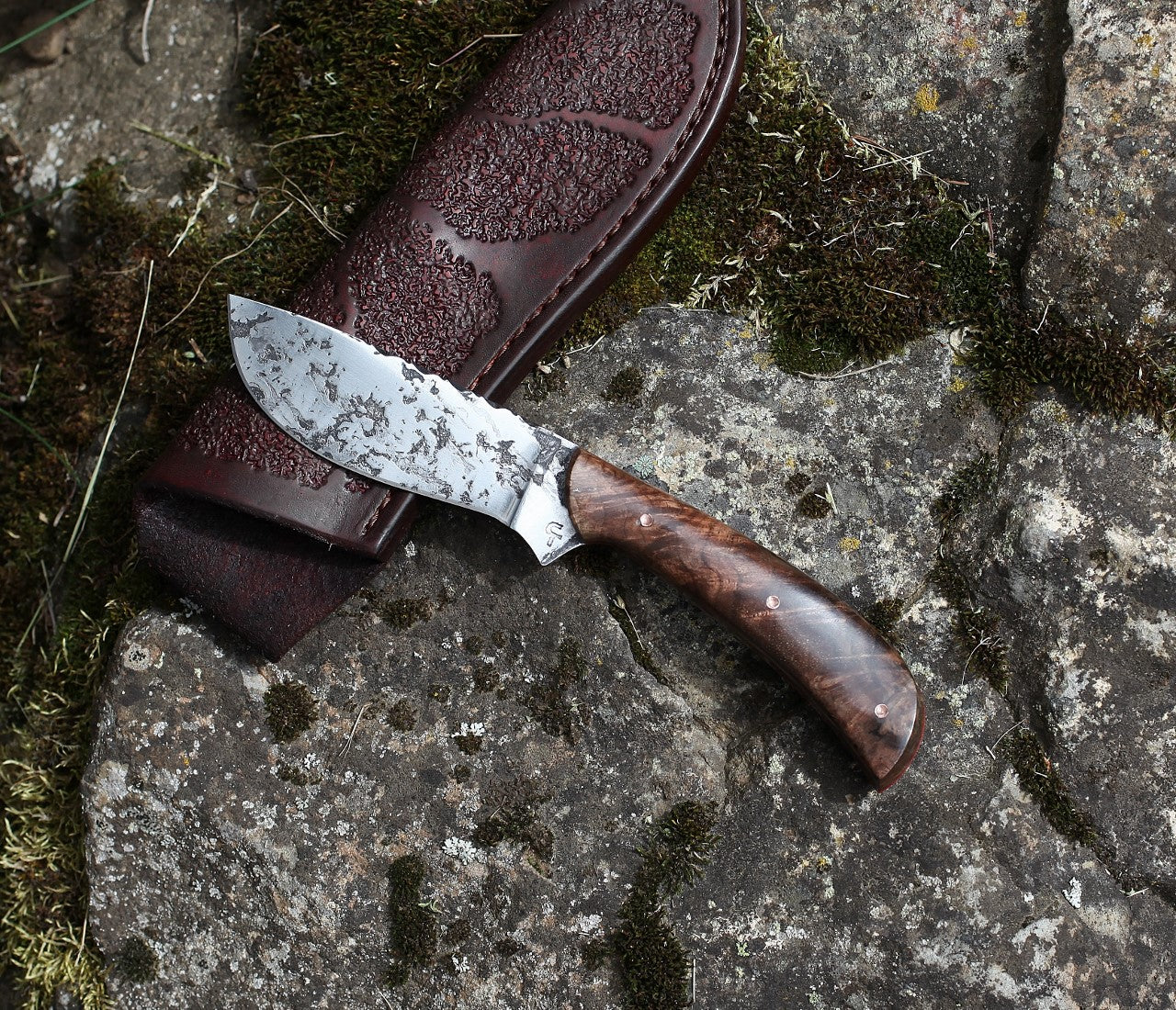 Large game hunter, redwood burl